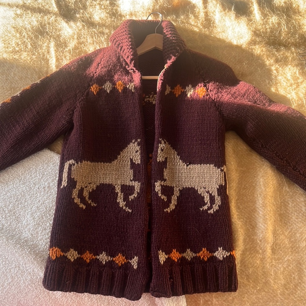 Beautiful handmade women’s chunky horse zip up sweater. Can fit size xs-medium